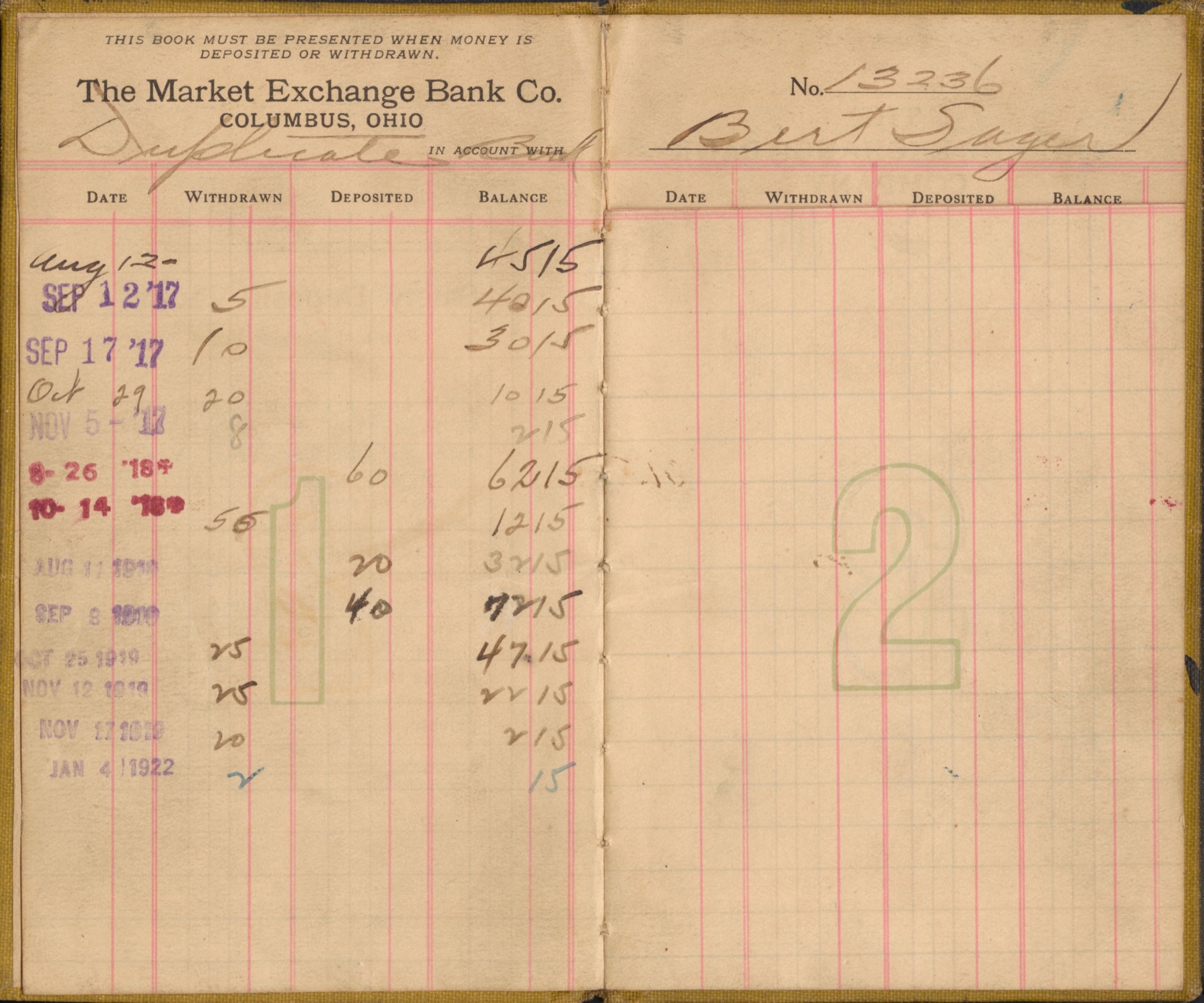 An open bank passbook: The Market Exchange Bank Co., Columbus, Ohio, in account with Bert Sayer, number 13236. Printed columns for date, withdrawn, deposited and balance, filled in by hand.
